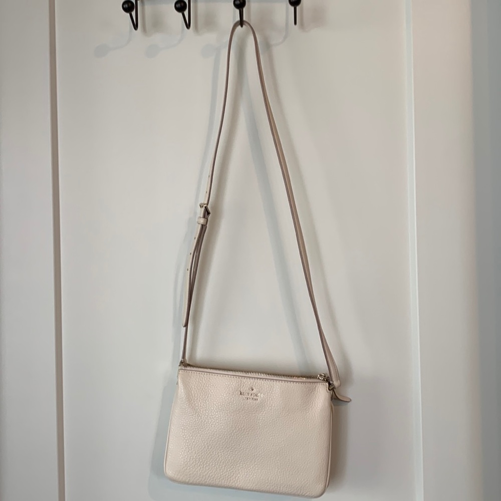 Cream colored Kate Spade cross body
